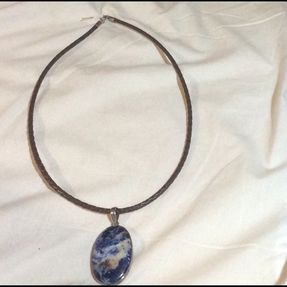 Sodalite piece strung on braided leather cord. - Picture 2 of 3